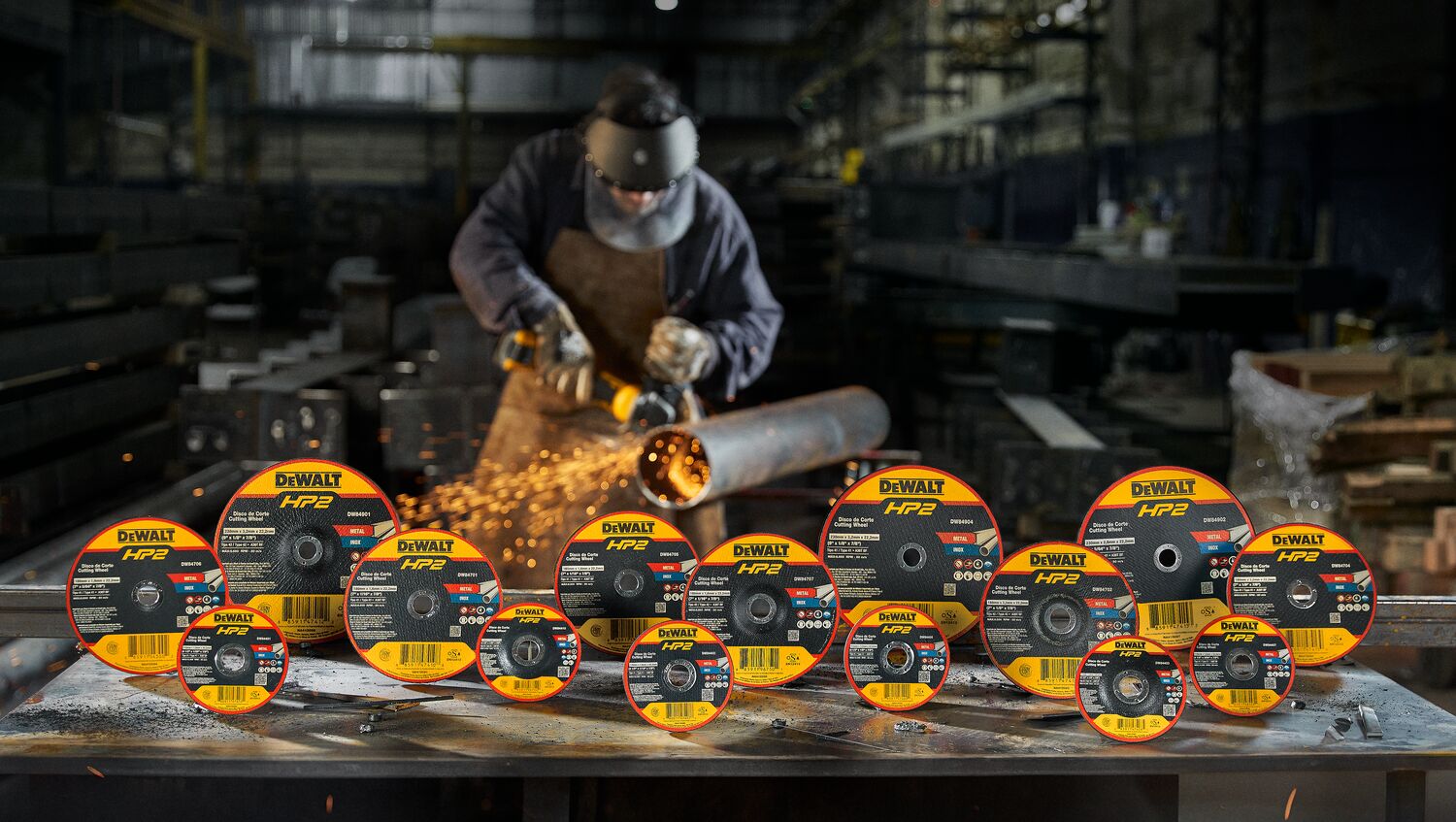 DEWALT  METAL FACTORYFRONT VIEWPACKSHOT with operator cutting steel pipe on te back