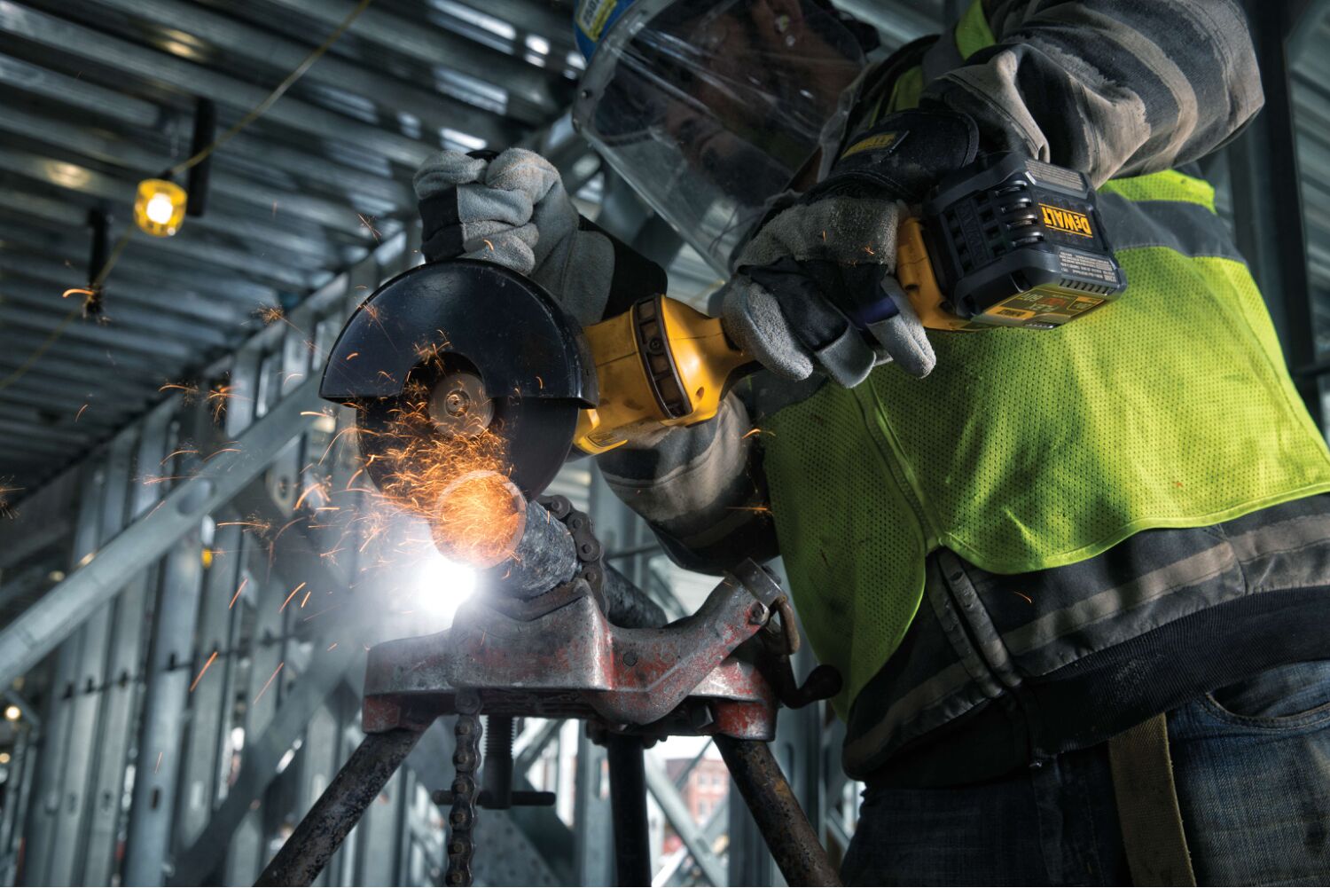 profile of GRINDER 1 BATTERY with an abrasive wheel attachment in action